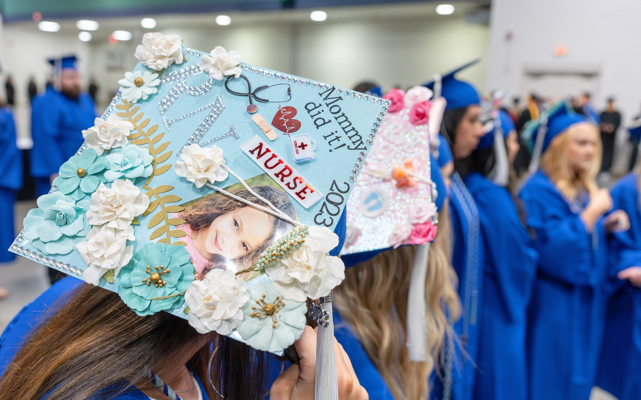 A nursing graduate’s decorated mortar board is displayed as the graduates wait to line up at Randolph Community College’s 2023 Curriculum Graduation, held Wednesday, May 10, at the Special Events Center of the Greensboro Coliseum Complex.
